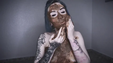 Slim Black-Haired Girl Applies Face Mask, Touches Face